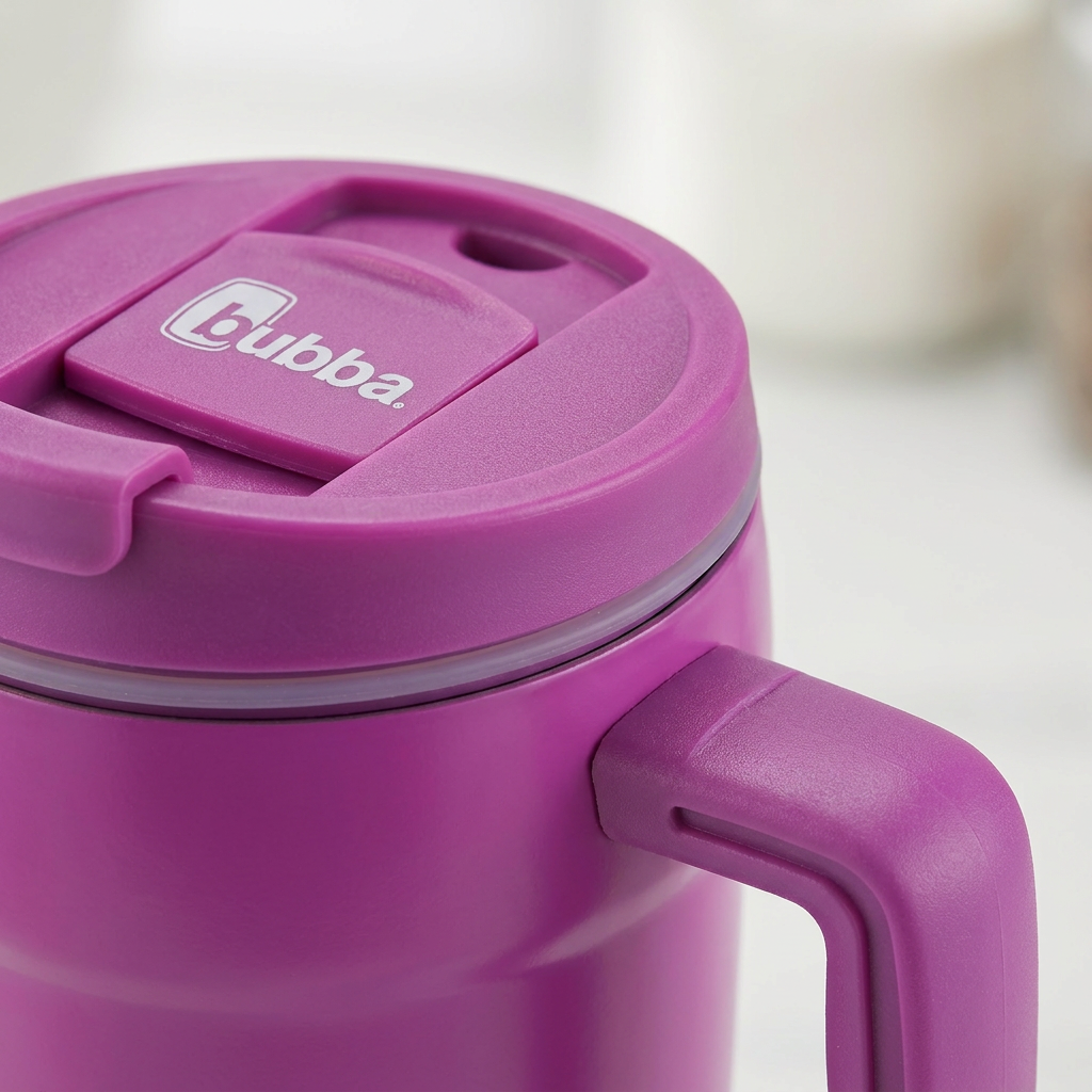 A close-up view of the magenta Bubba Hero XL Tumbler's lid, showing the sliding mechanism, Bubba logo, handle connection, and gasket.