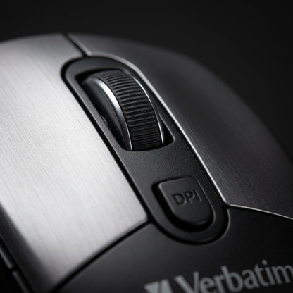 A detailed macro photograph showing the textured scroll wheel and DPI button of the Verbatim Silent Ergo Wireless Blue LED Mouse.