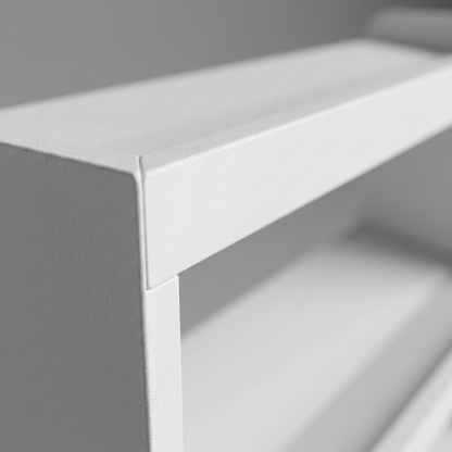 Extreme close-up showing the textured finish and precise joinery of the white RAKABOT Titan panel.