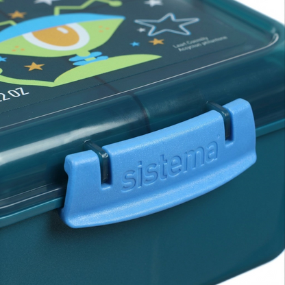 A close-up of the Sistema Kids Bento Cube's secure locking clip and detailed graphic lid.